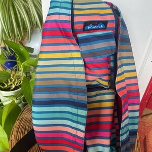 Kavu Rainbow Striped Sling Bag in Turquoise, Pink, Yellow, Navy, Brown